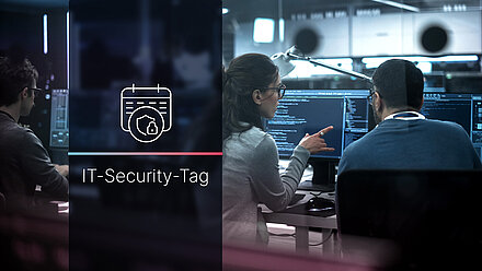 Zwei IT-Fachkräfte arbeiten vor Bildschirmen mit Code; daneben Schriftzug „IT-Security-Tag“ mit Kalender-Icon.